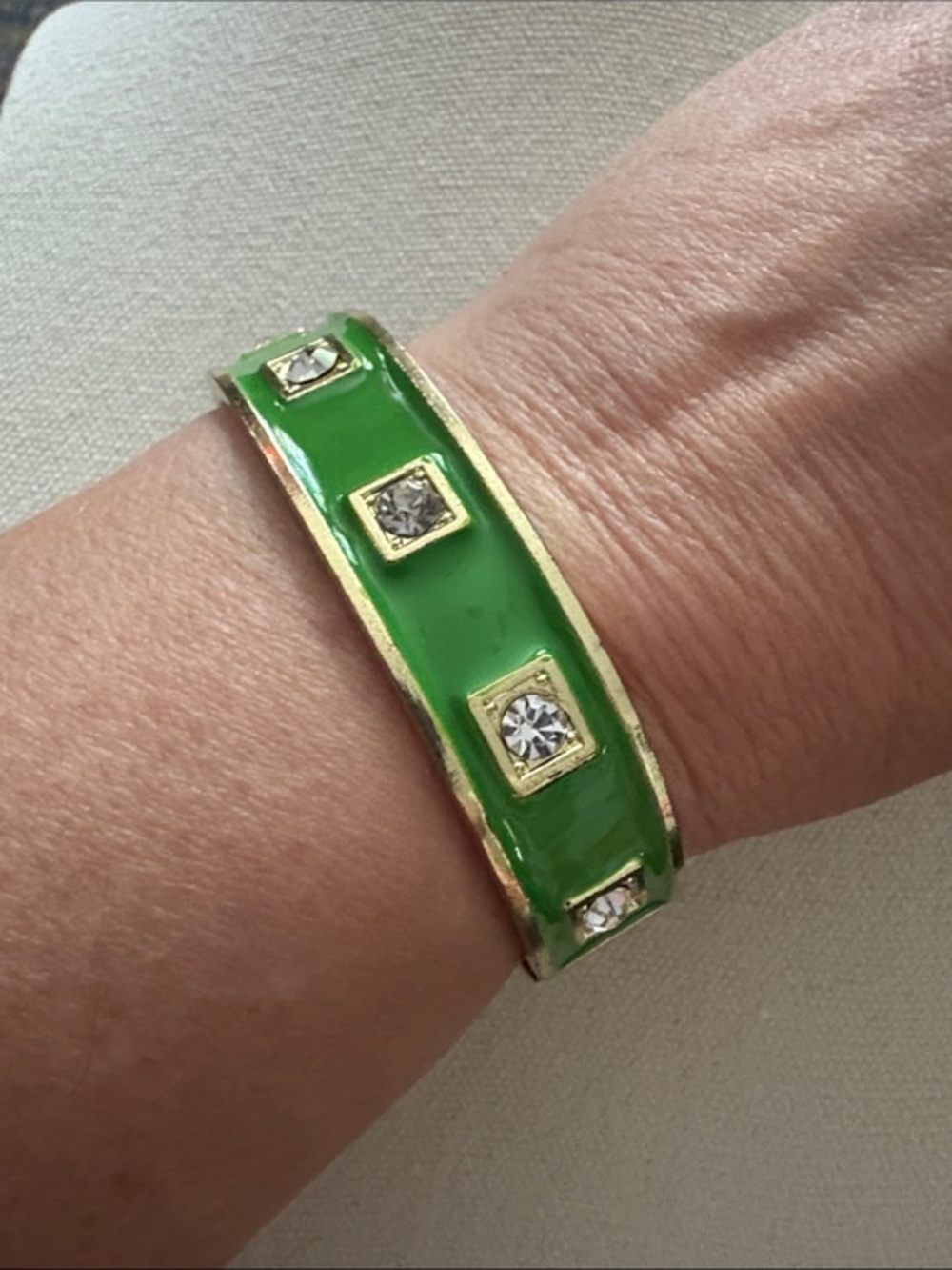 Gold-Tone and green enamel Oval Hinge Bangle Bracelet with square set rhinestone